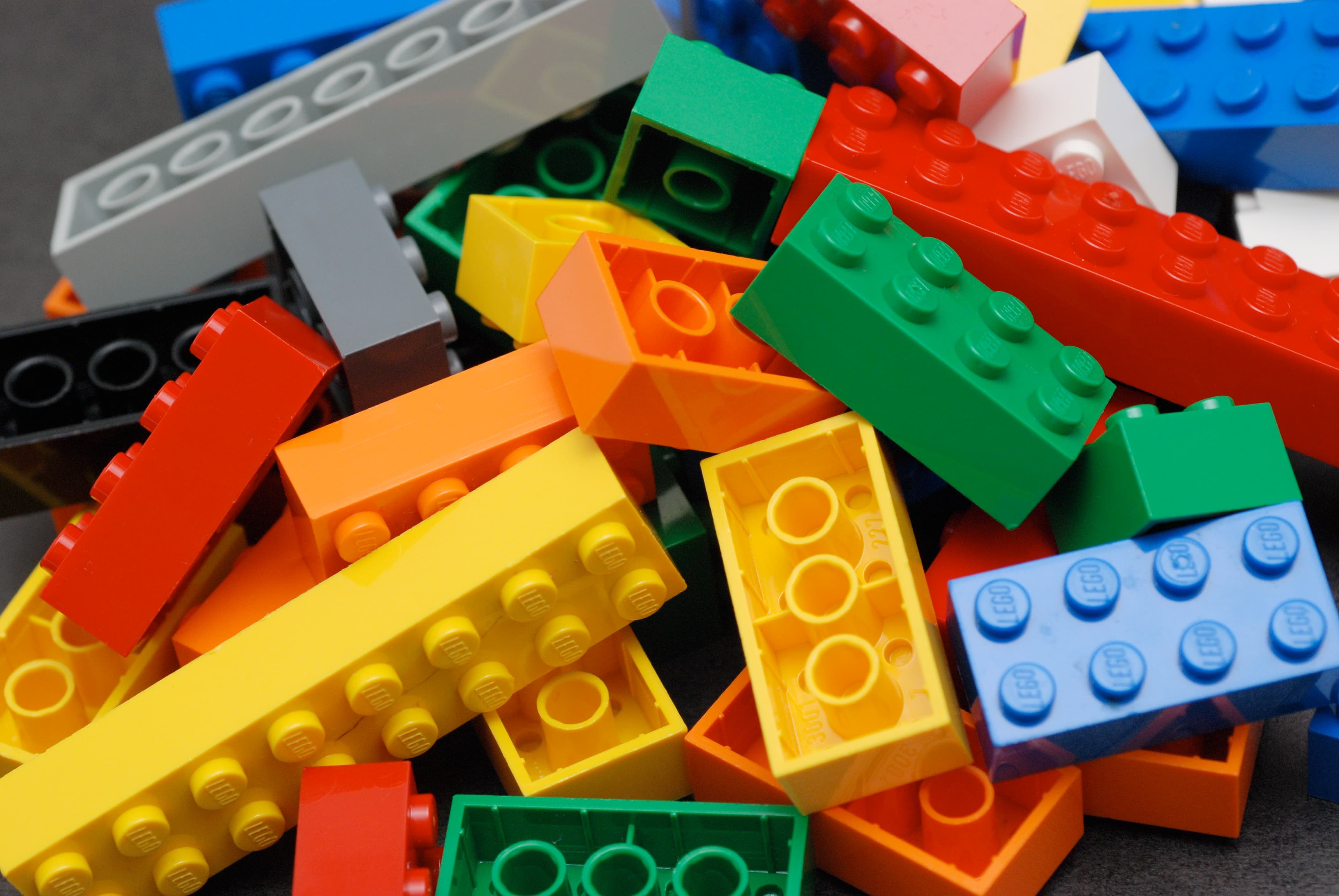 A colourful pile of 2x4 LEGO bricks.